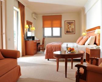 Athens Atrium Hotel & Jacuzzi Suites - Athens - Bedroom
