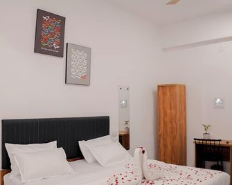 Hotel Royal Accord - Surat - Schlafzimmer