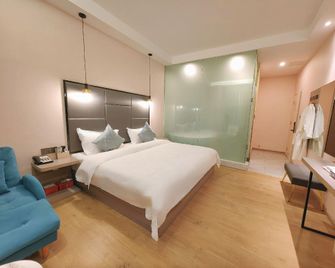 Manhui hotel - Baoshan - Bedroom
