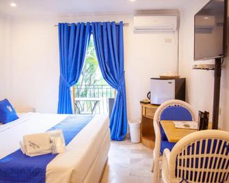 كلاركتون هوتل - انغيليس سيتي - غرفة نوم