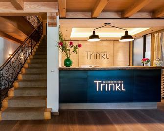 Ferienwohnungen Trinkl - Bad Wiessee - Front desk