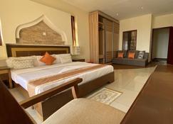 Lux Suites Shanzu Beachfront Apartments - Mombasa - Camera da letto
