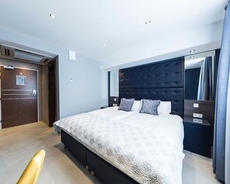 Hotel Tommasi - Mörfelden-Walldorf - Bedroom