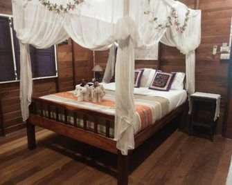 Orchid Hibiscus Guest House - Сухотаі - Спальня