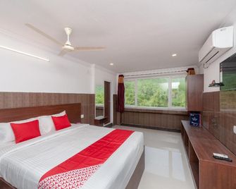 Capital O Srinivasa Residency - Tirupati - Κρεβατοκάμαρα