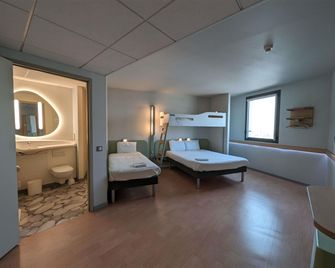 Ibis budget Clermont Ferrand le Brezet Aeroport - Clermont-Ferrand - Camera da letto