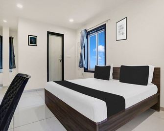 OYO Hotel O Ashok Nagar Near Jntu College - Kakinada - Slaapkamer