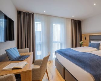 Aardo - Kind of A Hotel by Swiss Star - Döttingen - Habitación