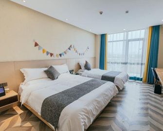 Coin Camp Inn - Nanjing - Schlafzimmer