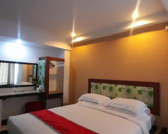 Hotel Prince Boulevard - Manado - Habitación