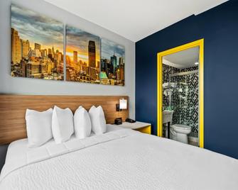 دايز إن باي ويندام نيويورك تشيناتاون - نيويورك - غرفة نوم