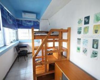 Haikou Hot Tide Youth Hostel - Haikou - Schlafzimmer