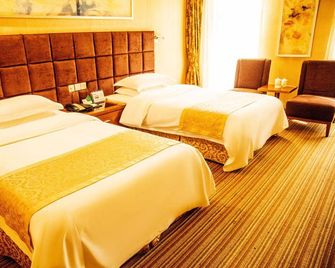 Spring Summer Fall Winter International Hotel - Baoding - Habitación