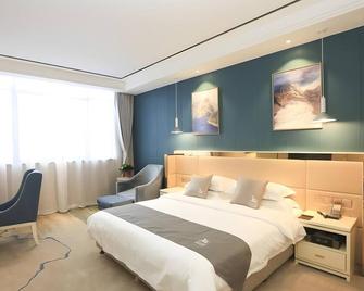 Greentree Eastern Bengbu City Guzhen County Century Hotel - Bengbu - Bedroom