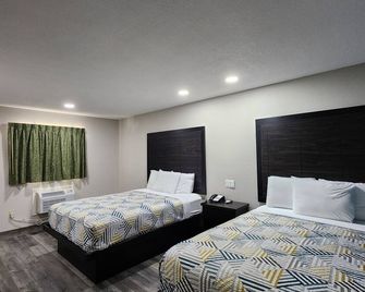 Scottish Inn & Suites - Wharton - Ložnice