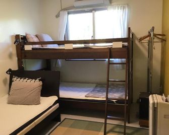 Guest House Shimaotoya Iriomotejima - Taketomi - Slaapkamer