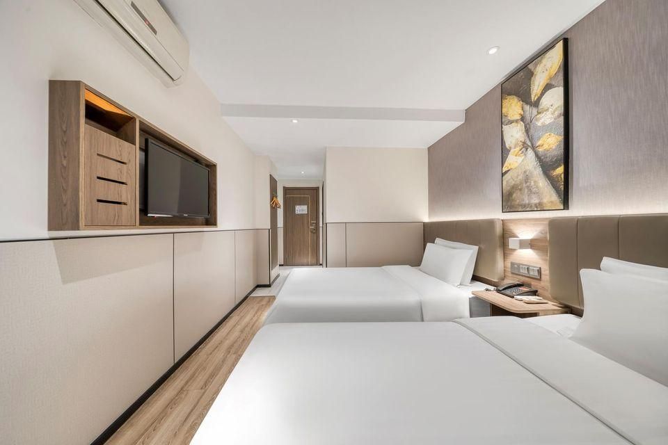7 Days Premium Hotel (Chongqing University Town Xijie Pedestrian Street) - تشونغتشي نغ - غرفة نوم