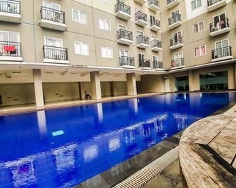 Studio Room at Sunter Park View Apartment By Travelio - Yakarta - Piscina