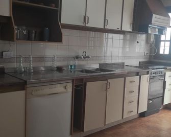 Tanino Home Suites - Mendoza - Kitchen