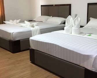 Meaco Royal Hotel -Tayuman - Manila - Schlafzimmer