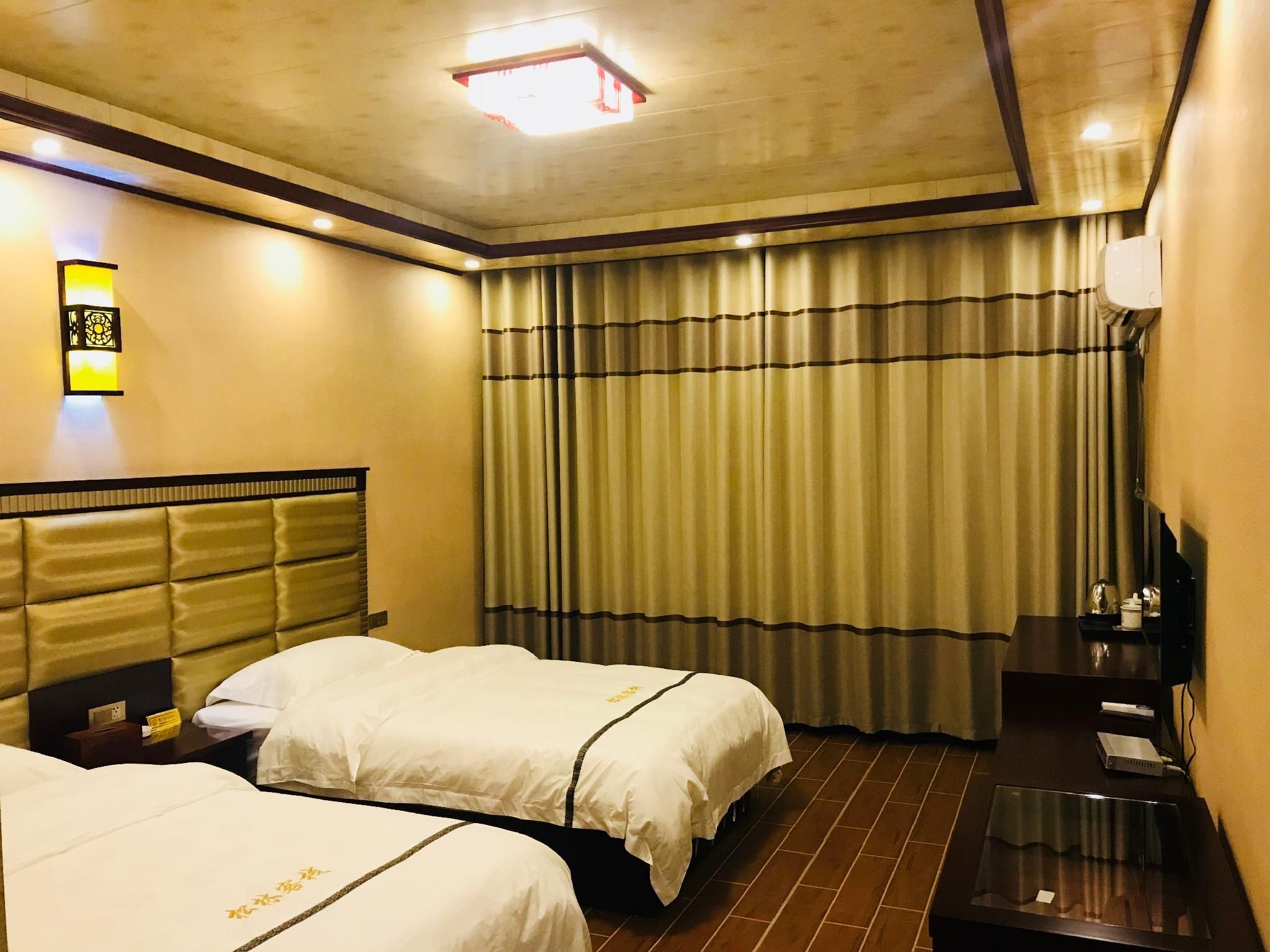 Huangguoshu Andu Hotel Guizhou Anshun - אנשון - חדר שינה