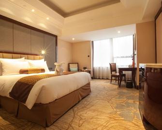 Xian heng Hotel - Shaoxing - Slaapkamer