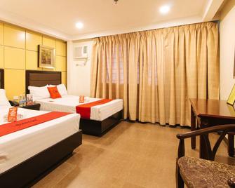 RedDoorz Plus @ Project 6 Quezon City - Quezon City - Bedroom