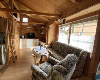 vacation paradise for kids and parents & also for your lovely four-legged friend - Gotthun - Wohnzimmer