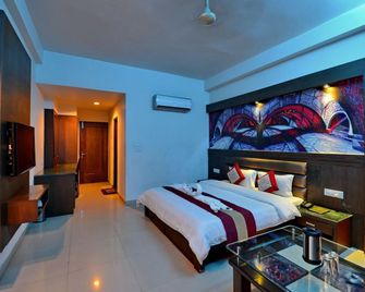 Hotel Namaskar Residency - אמריצר - חדר שינה