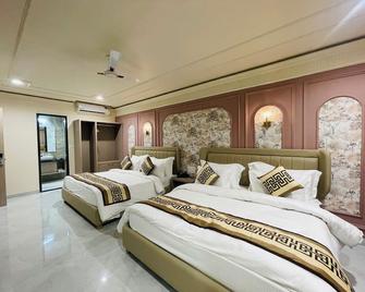 Krishna Resort Pushkar - פושקאר - חדר שינה