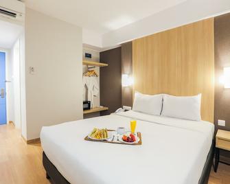 Hotel Citradream Bintaro - Tangerang City - חדר שינה