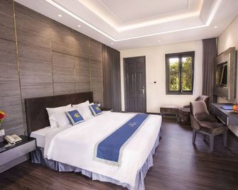 Beachfront Hotel - Vung Tau - Slaapkamer