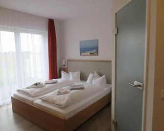 Reit- und Freizeithotel Friesenhof - Trassenheide - Slaapkamer