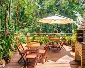 Pousada Entre Folhas - פאראטי - פטיו