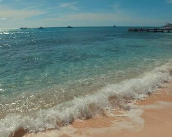 Visit Paradise @ Fruitfullville - West Bay - Beach