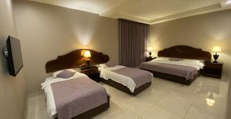 Mosaic City Hotel - Madaba - Schlafzimmer