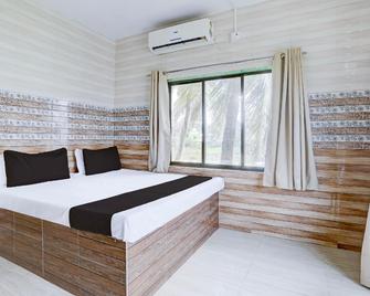 Hotel O Vintage Beach House - Mumbai - Bedroom