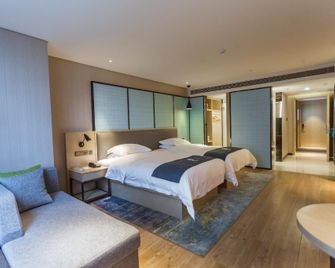 Echarm Hotel Wuhan Guanggu Walking Street Huazhong University Of Science And Technology - Wuhan - Makuuhuone