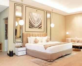 Adhiwangsa Hotel - Surakarta City - Bedroom