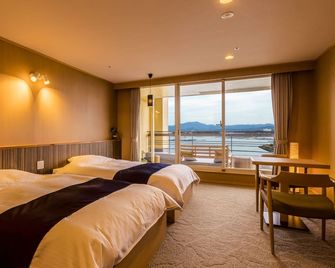 Ooedo Onsen Monogatari Premium Shirahama Gyoen - Shirahama - Slaapkamer