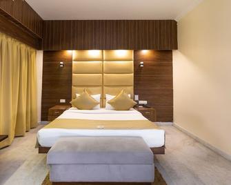 The Solitaire Hotel Dehdradun - Dehradun - Schlafzimmer