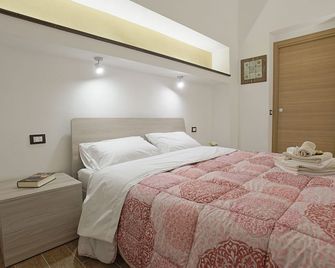 Le Maioliche Junior Suite - Agrigent - Schlafzimmer