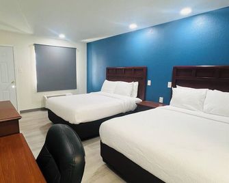 The Hallmark Inn & Suites Newly Renovated Rooms - San Antonio