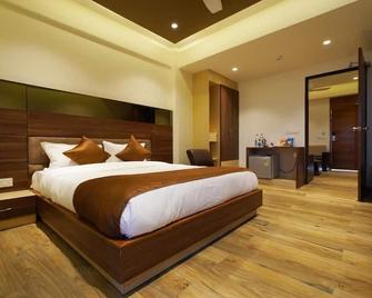 Hotel 4 Point - Gandhinagar - Schlafzimmer
