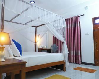 The Cattleya Guest House Sigiriya - Sigiriya - Slaapkamer