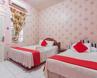 Hotel O Vida Homestay - Samarinda - Slaapkamer