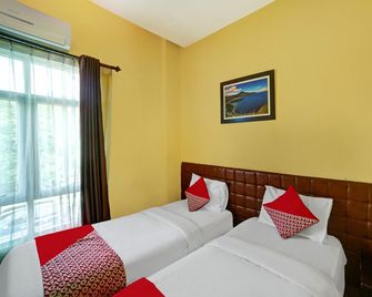 Hotel O Wesly House - Medan - Slaapkamer