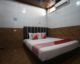 OYO 1234 Hotel Silampari - Lubuklinggau - Habitación