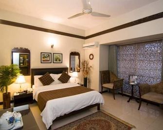 Cross Winds - Islamabad - Camera da letto