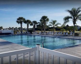 RV Site for Rent at The Great Outdoors Resort backed up to the 14th green - Titusville - Pool